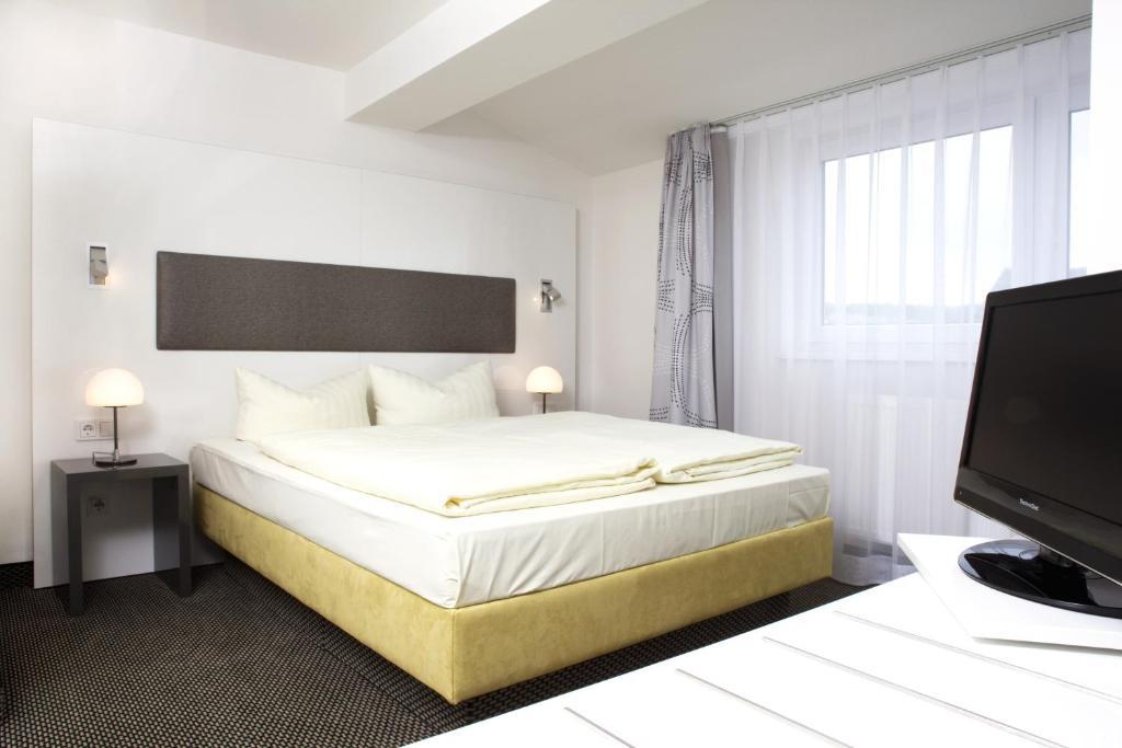 Russmann Hotel & Living Goldbach  الغرفة الصورة